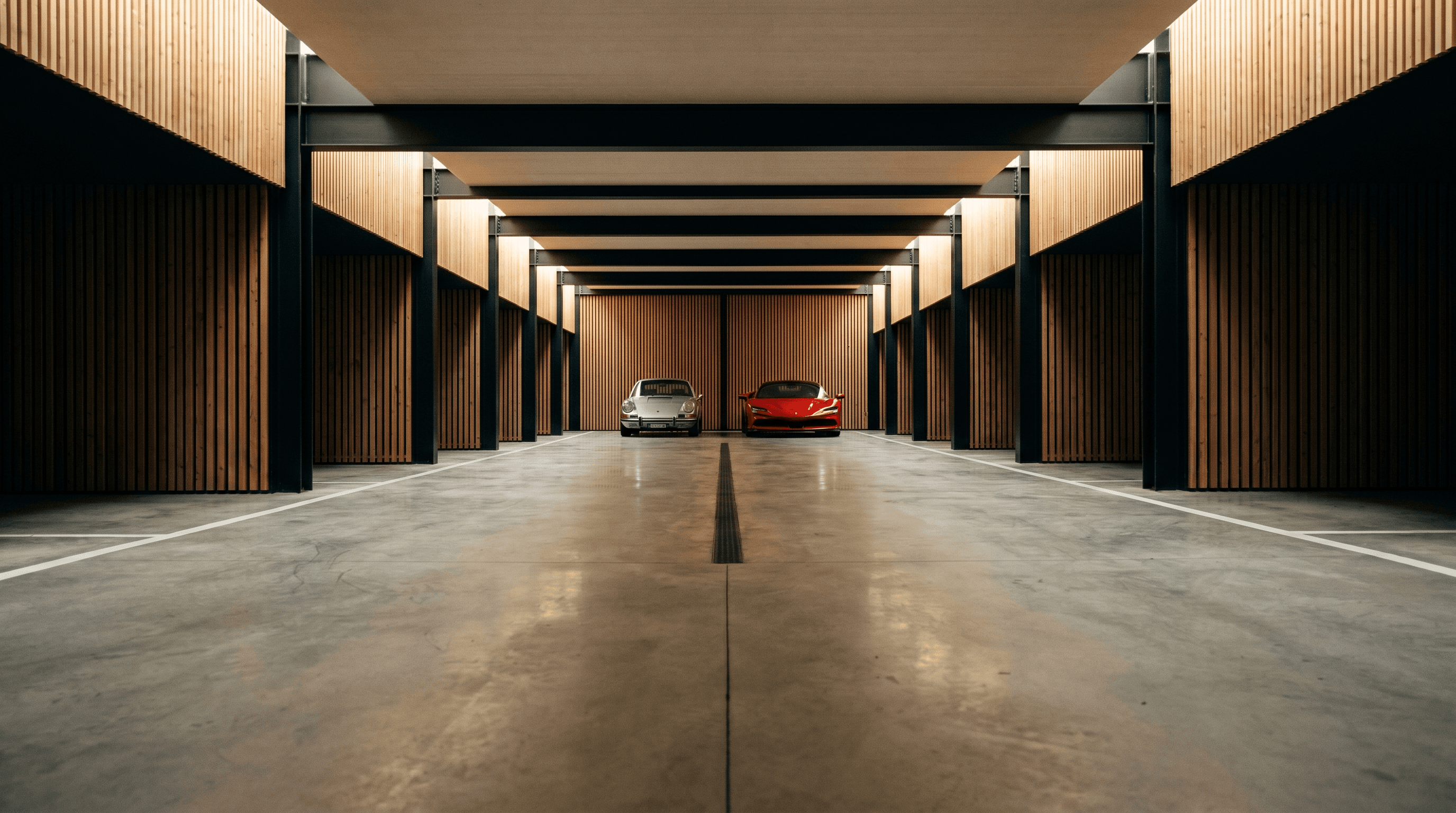 Cheval Noir atelier facility — private automotive storage facility at night